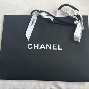 CHANEL Black Gift Bag with White Camellia
